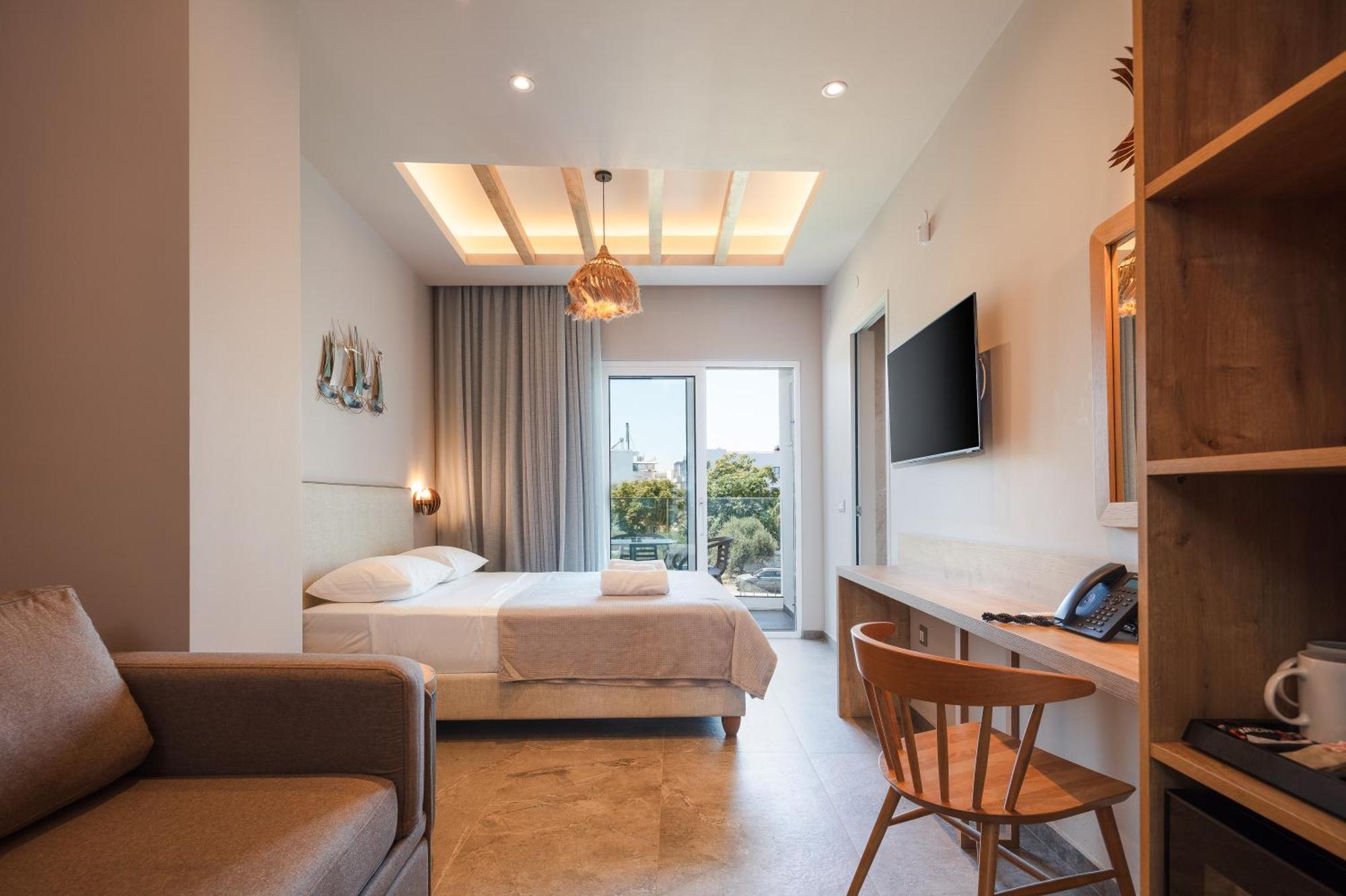 Skipper Beachfront Suites Херсонісос Номер фото