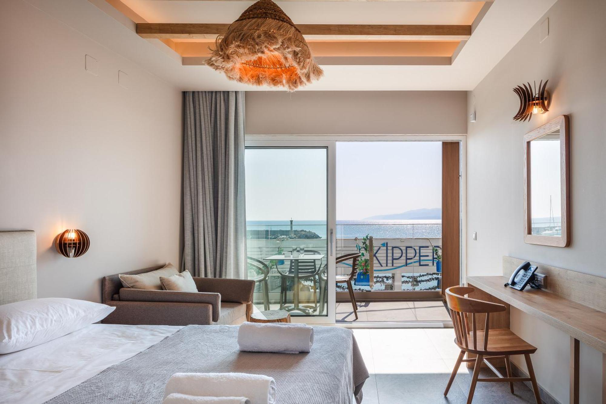 Skipper Beachfront Suites Херсонісос Номер фото
