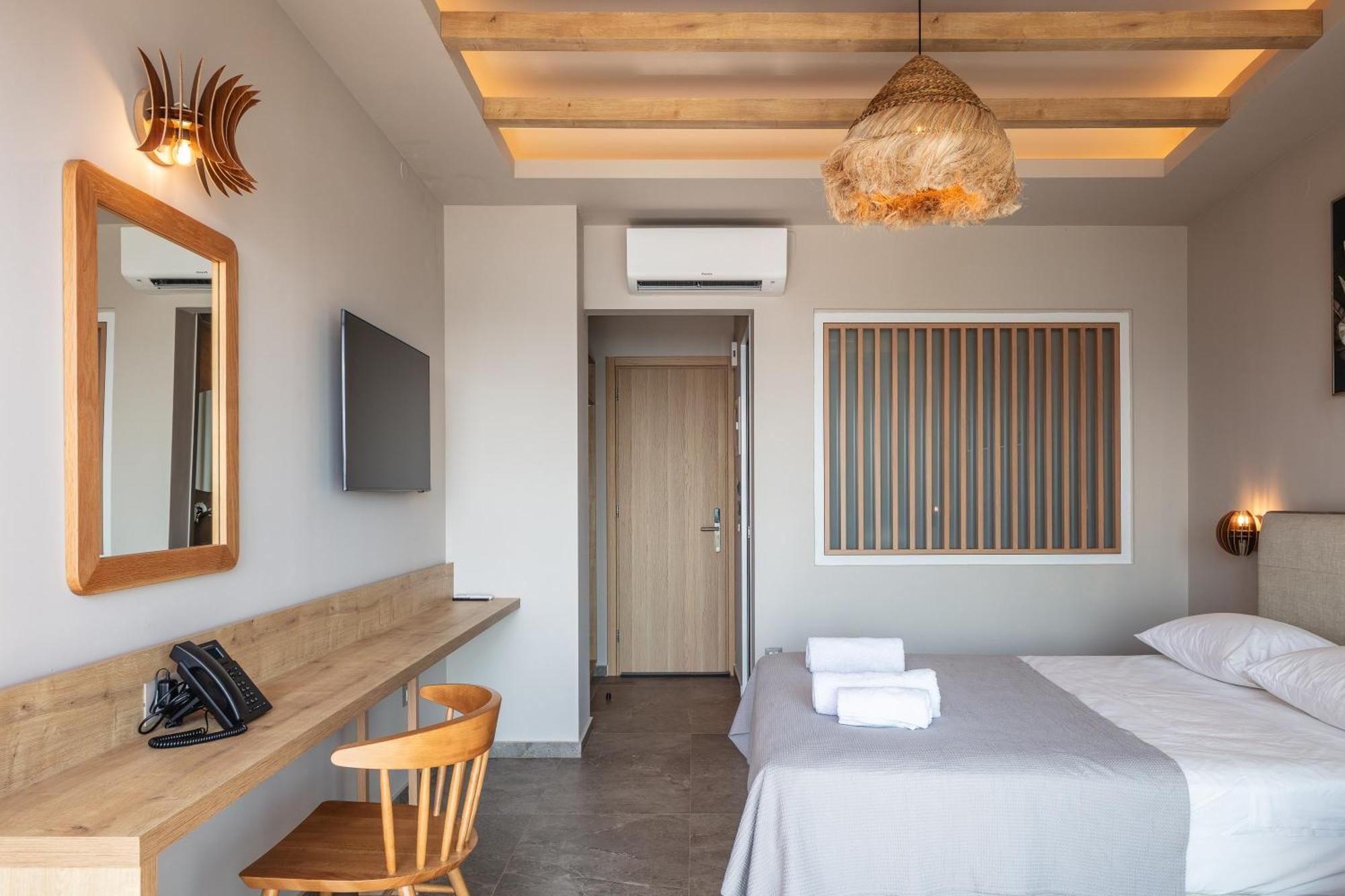 Skipper Beachfront Suites Херсонісос Номер фото