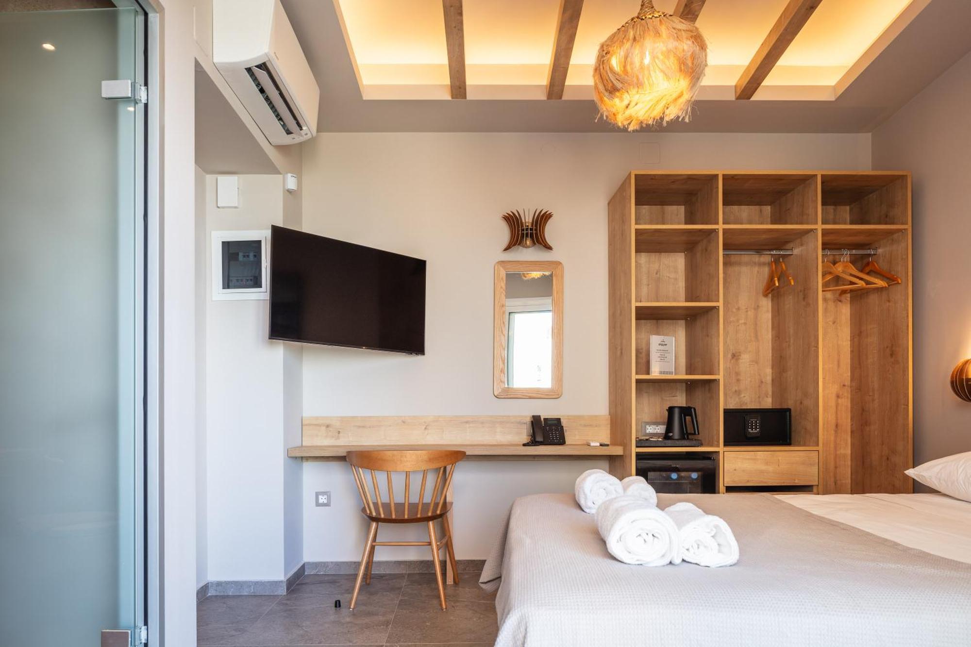 Skipper Beachfront Suites Херсонісос Номер фото