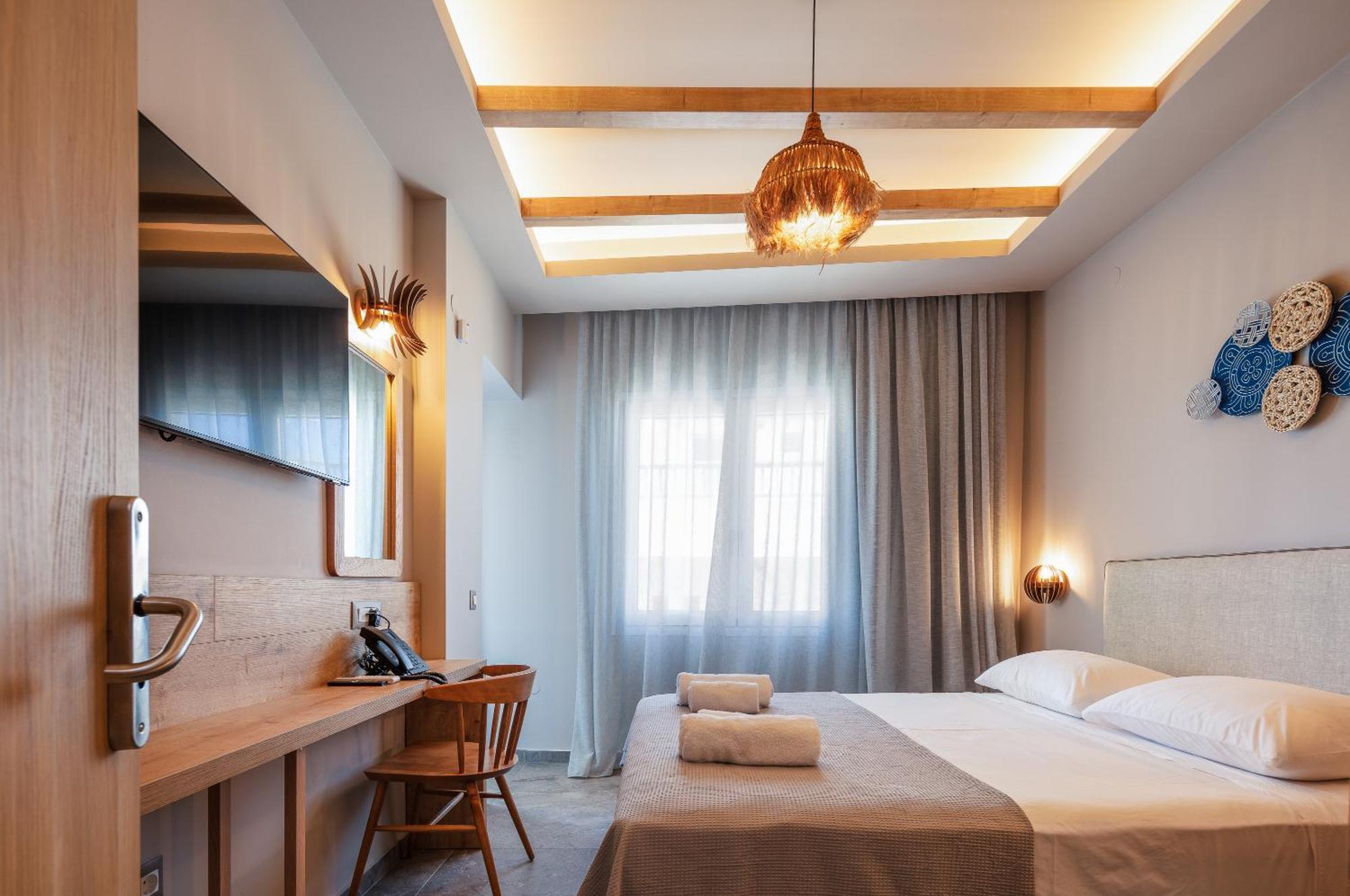 Skipper Beachfront Suites Херсонісос Номер фото