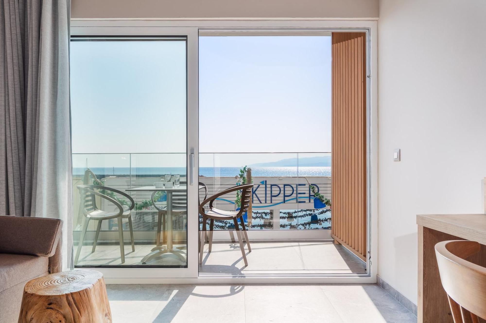 Skipper Beachfront Suites Херсонісос Номер фото
