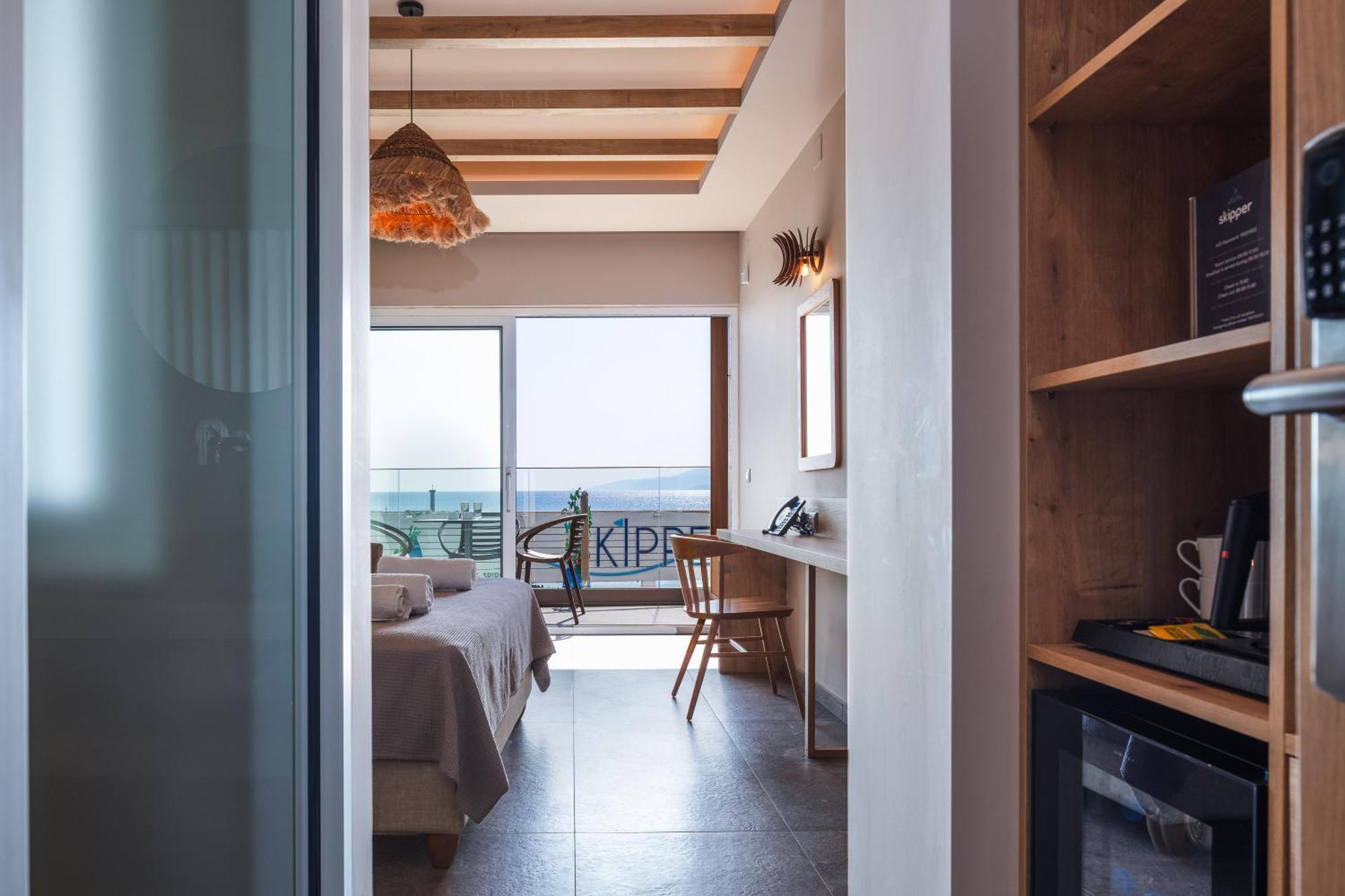 Skipper Beachfront Suites Херсонісос Номер фото